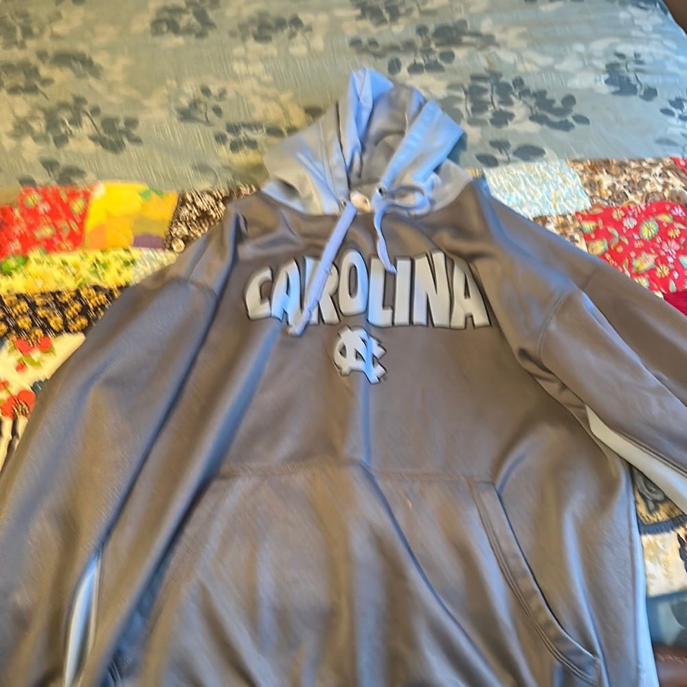 North Carolina TarHeels colored hoodie.